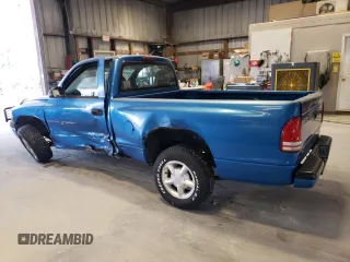 1999 Dodge Dakota SLT with VIN 1B7FL26X0XS298131, listed as a Copart auction lot 69590254 with 162,606 mi miles and Salvage Title. Bid and sale history available at carsss.com. Image 2.