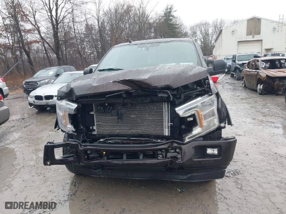 2020 Ford F-150 XL with VIN 1FTEW1EP6LFC14864, listed as a IAAI auction lot 41051542 with 67,694 mi miles. Bid and sale history available at carsss.com. Image 12.