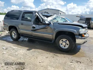 2002 Chevrolet Suburban LT z VIN 3GNGK26G82G294276, wystawiony jako Copart lot #56399015 z przebiegiem 187 305 mil mil oraz Nie do naprawy • Non repairable. Historia ofert i sprzedaży dostępna na DreamBid. Obrazek 4.