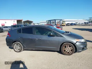 2012 Honda Insight LX with VIN JHMZE2H51CS003694, listed as a IAAI auction lot 41781384 with 154,685 mi miles and . Bid and sale history available at DreamBid. Image 13.