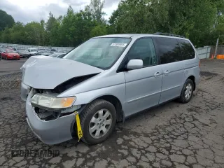 2004 Honda Odyssey EX-L with VIN 5FNRL18934B003554, listed as a Copart auction lot 57888905 with 208,654 mi miles and Salvage title. Bid and sale history available at DreamBid. Image 1.