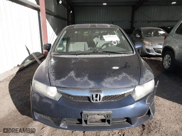 2009 Honda Civic Sdn LX with VIN 2HGFA16559H544472, listed as a IAAI auction lot 41695513 with 124,845 mi miles. Bid and sale history available at carsss.com. Image 12.