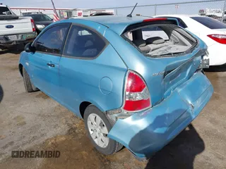 2007 Hyundai Accent GS with VIN KMHCM36C87U025960, listed as a IAAI auction lot 41253249 with 198,074 mi miles. Bid and sale history available at carsss.com. Image 3.