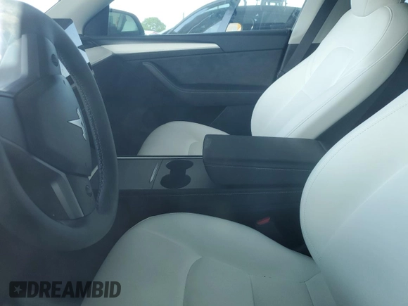 2024 Tesla Model Y с VIN 7SAYGDED3RF044335, выставлен на аукционе Copart как лот 58263265 с пробегом Не указан миль и Списание • Salvage title. История ставок и продаж доступна на DreamBid. Изображение 7.