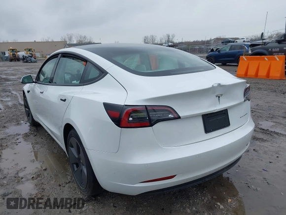 2022 Tesla Model 3 Long Range with VIN 5YJ3E1EB6NF272009, listed as a IAAI auction lot 41984154 with 12,651 mi miles and . Bid and sale history available at DreamBid. Image 3.