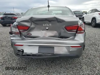 2023 Kia Rio S with VIN 3KPA24AD1PE531460, listed as a Copart auction lot 74285564 with 22,255 mi miles and Salvage Title. Bid and sale history available at DreamBid. Image 6.