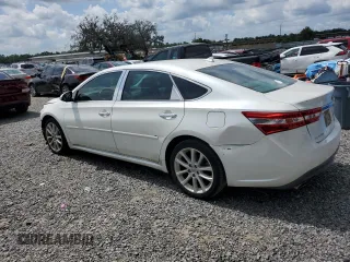 2013 Toyota Avalon XLE with VIN 4T1BK1EB2DU061038, listed as a Copart auction lot 63974195 with 122,432 mi miles and Salvage title. Bid and sale history available at DreamBid. Image 2.