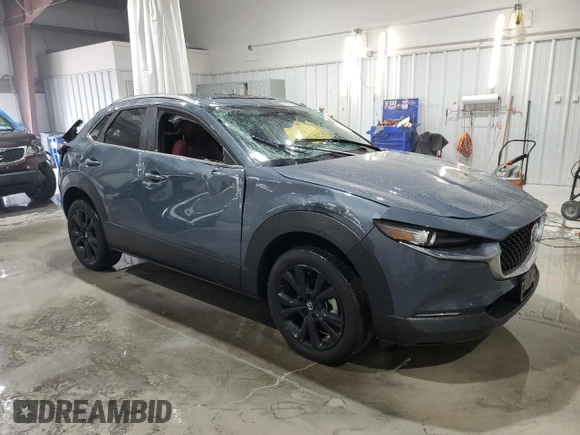 2024 Mazda CX-30 S Carbon Edition with VIN 3MVDMBCM7RM637315, listed as a Copart auction lot 55108695 with 8,476 mi miles and Salvage title. Bid and sale history available at DreamBid. Image 4.