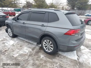 2018 Volkswagen Tiguan S with VIN 3VV0B7AX1JM143571, listed as a IAAI auction lot 41555436 with 72,545 mi miles. Bid and sale history available at carsss.com. Image 3.