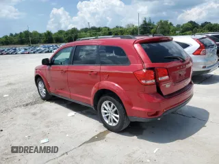 2018 Dodge Journey SXT with VIN 3C4PDCBG8JT310433, listed as a Copart auction lot 64063125 with 77,087 mi miles and Salvage title. Bid and sale history available at DreamBid. Image 2.