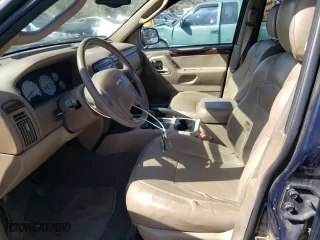 2004 Jeep Grand Cherokee Limited with VIN 1J4GW58N44C417159, listed as a Copart auction lot 52028465 with 114,091 mi miles and Clean Title. Bid and sale history available at carsss.com. Image 7.
