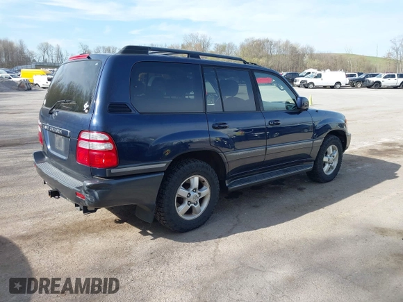 2004 Toyota Land Cruiser with VIN JTEHT05J942054673, listed as a IAAI auction lot 42112791 with 206,784 mi miles. Bid and sale history available at carsss.com. Image 4.