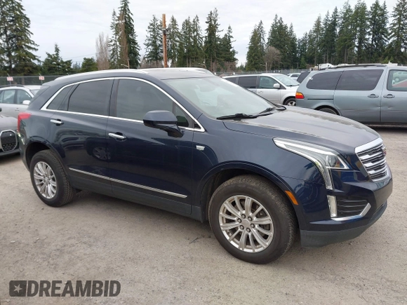 2017 Cadillac XT5 FWD with VIN 1GYKNARS2HZ188557, listed as a IAAI auction lot 41840764 with 104,524 mi miles. Bid and sale history available at carsss.com. Image 13.