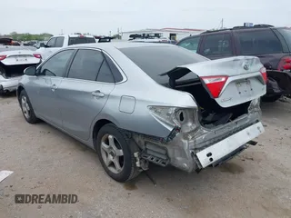 2015 Toyota Camry XLE with VIN 4T4BF1FKXFR472201, listed as a IAAI auction lot 41883944 with 143,296 mi miles and . Bid and sale history available at DreamBid. Image 3.