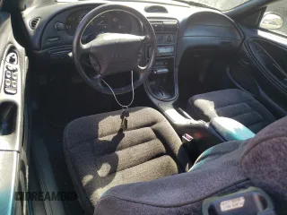 1994 Ford Mustang with VIN 1FALP4442RF186105, listed as a Copart auction lot 74677924 with 185,072 mi miles and Clean title. Bid and sale history available at DreamBid. Image 8.