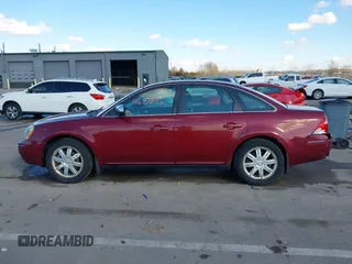 2006 Ford Five Hundred Limited z VIN 1FAFP28106G180763, wystawiony jako IAAI lot #41672882 z przebiegiem 127 357 mil mil oraz . Historia ofert i sprzedaży dostępna na DreamBid. Obrazek 14.