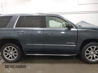 2019 GMC Yukon Denali with VIN 1GKS2CKJ9KR359070, listed as a IAAI auction lot 41682027 with 95,015 mi miles. Bid and sale history available at carsss.com. Image 13.