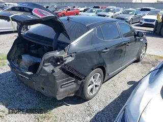 2016 Kia Optima Hybrid with VIN KNAGM4ADXG5096533, listed as a IAAI auction lot 41986694 with 1 mi miles. Bid and sale history available at carsss.com. Image 4.