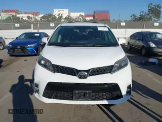 2018 Toyota Sienna SE with VIN 5TDXZ3DC9JS958563, listed as a IAAI auction lot 41650952 with 127,636 mi miles and . Bid and sale history available at DreamBid. Image 6.