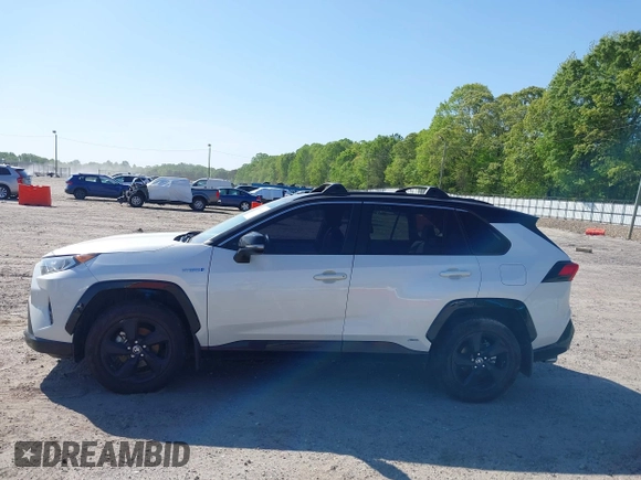 2021 Toyota RAV4 Hybrid XSE with VIN JTME6RFV4MJ008825, listed as a IAAI auction lot 42060148 with 91,129 mi miles and . Bid and sale history available at DreamBid. Image 14.
