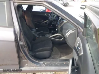 2015 Hyundai Veloster RE:FLEX with VIN KMHTC6AD1FU232984, listed as a IAAI auction lot 41570593 with 180,435 mi miles. Bid and sale history available at carsss.com. Image 5.