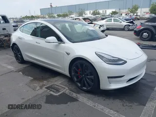 2020 Tesla Model 3 Performance z VIN 5YJ3E1EC9LF641242, wystawiony jako IAAI lot #42380146 z przebiegiem Nie podano mil oraz . Historia ofert i sprzedaży dostępna na DreamBid. Obrazek 1.
