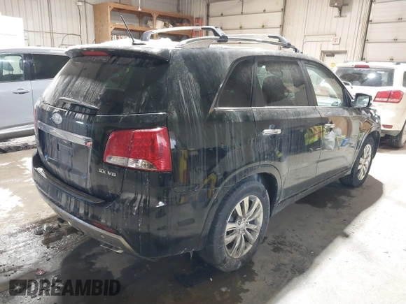 2012 Kia Sorento SX with VIN 5XYKW4A2XCG209369, listed as a IAAI auction lot 41693091 with 195,249 mi miles. Bid and sale history available at carsss.com. Image 4.