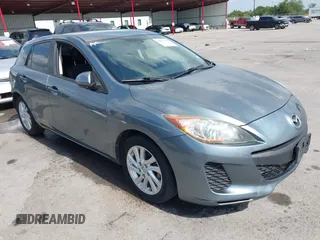 2012 Mazda Mazda3 i Touring with VIN JM1BL1L73C1562553, listed as a IAAI auction lot 42073390 with 227,269 mi miles. Bid and sale history available at carsss.com. Image 1.