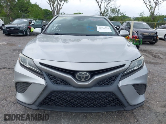 2019 Toyota Camry LE z VIN 4T1B11HK9KU708465, wystawiony jako IAAI lot #41921754 z przebiegiem 119 106 mil mil oraz . Historia ofert i sprzedaży dostępna na DreamBid. Obrazek 13.