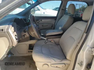2006 Buick Rendezvous with VIN 3G5DB03L26S521862, listed as a Copart auction lot 82216664 with 157,479 mi miles and Salvage Title. Bid and sale history available at DreamBid. Image 7.