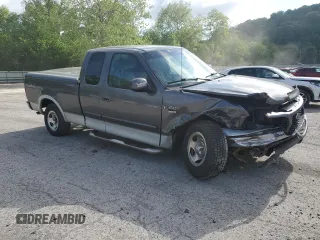 2003 Ford F-150 XL with VIN 2FTRX18L73CA49989, listed as a Copart auction lot 57434025 with 141,876 mi miles and Salvage title. Bid and sale history available at DreamBid. Image 4.