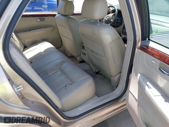2006 Cadillac DTS w/1SC with VIN 1G6KD57Y26U112518, listed as a IAAI auction lot 42100747 with 122,149 mi miles. Bid and sale history available at carsss.com. Image 8.