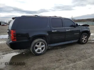 2014 Chevrolet Suburban LT with VIN 1GNSCJE01ER222961, listed as a Copart auction lot 84841744 with 168,131 mi miles and Salvage title. Bid and sale history available at DreamBid. Image 3.