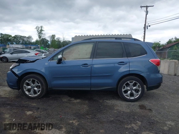 2018 Subaru Forester Touring with VIN JF2SJAWC5JH528330, listed as a IAAI auction lot 42344618 with 62,446 mi miles and . Bid and sale history available at DreamBid. Image 14.