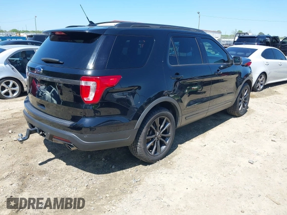 2018 Ford Explorer XLT with VIN 1FM5K7D85JGC38990, listed as a IAAI auction lot 42004295 with 147,499 mi miles and . Bid and sale history available at DreamBid. Image 4.