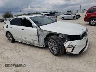 2024 BMW 5 Series 530i with VIN WBA43FJ03RCR61887, listed as a Copart auction lot 69975144 with 2,737 mi miles and Salvage Title. Bid and sale history available at carsss.com. Image 4.