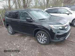 2019 Honda Pilot EX-L with VIN 5FNYF6H55KB071767, listed as a IAAI auction lot 41941696 with 66,844 mi miles and . Bid and sale history available at carsss.com. Image 1.