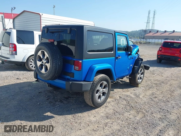 2016 Jeep Wrangler Sahara with VIN 1C4AJWBG9GL112139, listed as a IAAI auction lot 40286816 with 54,568 mi miles and . Bid and sale history available at DreamBid. Image 4.