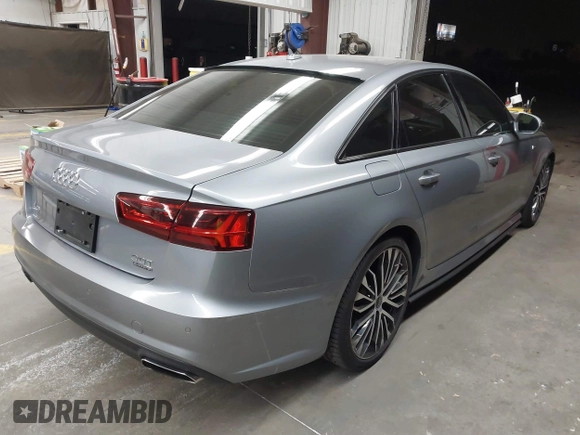 2017 Audi A6 Premium Plus z VIN WAUF2AFC9HN128728, wystawiony jako IAAI lot #41699063 z przebiegiem 110 475 mil mil oraz . Historia ofert i sprzedaży dostępna na DreamBid. Obrazek 4.