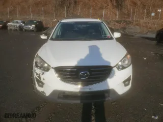 2016 Mazda CX-5 Touring with VIN JM3KE4CY2G0749547, listed as a Copart auction lot 49955475 with 102,519 mi miles and Salvage Title. Bid and sale history available at carsss.com. Image 5.