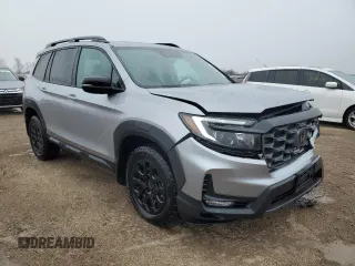 2023 Honda Passport TrailSport with VIN 5FNYF8H64PB044233, listed as a Copart auction lot 53522015 with 10,458 mi miles and Salvage title. Bid and sale history available at DreamBid. Image 4.