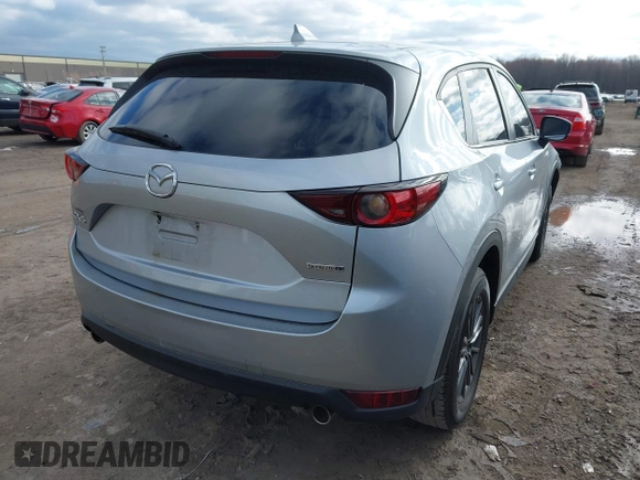 2020 Mazda CX-5 Touring with VIN JM3KFACM5L0768371, listed as a IAAI auction lot 41862623 with 138,446 mi miles and . Bid and sale history available at carsss.com. Image 4.