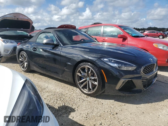 2022 BMW Z4 sDriveM40i with VIN WBAHF9C04NWX90938, listed as a Copart auction lot 74031664 with 7,813 mi miles and Non repairable. Bid and sale history available at DreamBid. Image 4.