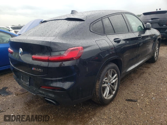 2021 BMW X4 M40i with VIN 5UX2V5C00M9H95699, listed as a Copart auction lot 63564433 with 33,500 mi miles and Salvage title. Bid and sale history available at DreamBid. Image 3.