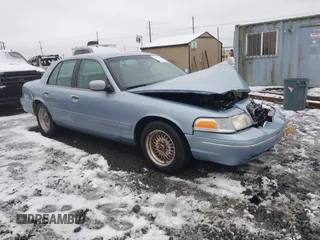 1998 Ford Crown Victoria LX с VIN 2FAFP74W4WX100549, выставлен на аукционе IAAI как лот 41573494 с пробегом 114 818 миль миль и . История ставок и продаж доступна на DreamBid. Изображение 1.