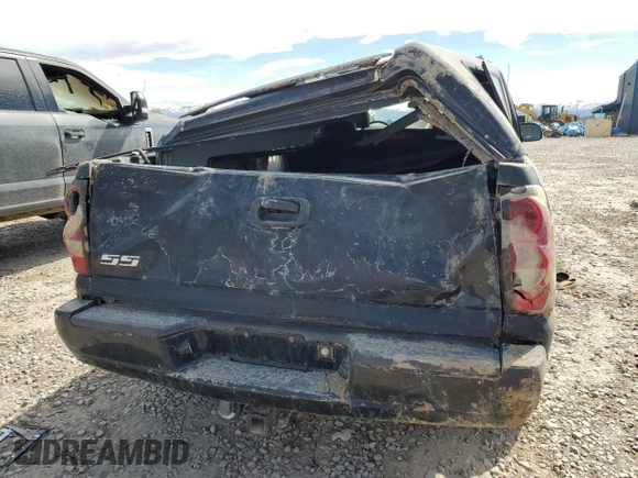 2004 Chevrolet Silverado SS z VIN 2GCEK19N641160222, wystawiony jako Copart lot #53939924 z przebiegiem Nie podano mil oraz Szkoda całkowita • Salvage title. Historia ofert i sprzedaży dostępna na DreamBid. Obrazek 6.