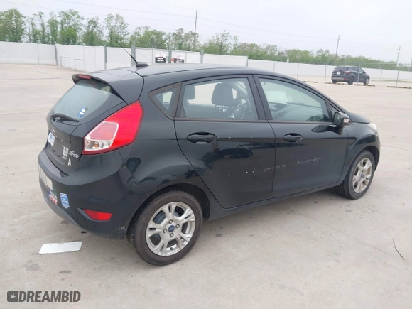 2016 Ford Fiesta SE with VIN 3FADP4EJ3GM203760, listed as a IAAI auction lot 41928386 with 52,744 mi miles. Bid and sale history available at carsss.com. Image 4.