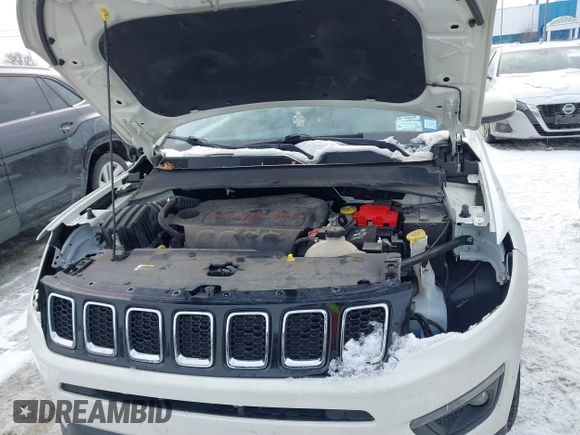 2019 Jeep Compass Latitude with VIN 3C4NJDBB0KT813014, listed as a IAAI auction lot 41560221 with 63,307 mi miles. Bid and sale history available at carsss.com. Image 10.