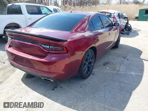 2021 Dodge Charger SXT with VIN 2C3CDXBG2MH616146, listed as a IAAI auction lot 41893157 with 64,676 mi miles. Bid and sale history available at carsss.com. Image 4.