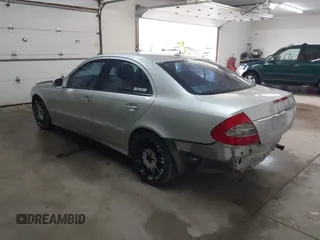 2007 Mercedes-Benz E-Class 3.5L with VIN WDBUF87X77B167115, listed as a IAAI auction lot 41721446 with 184,721 mi miles. Bid and sale history available at carsss.com. Image 3.
